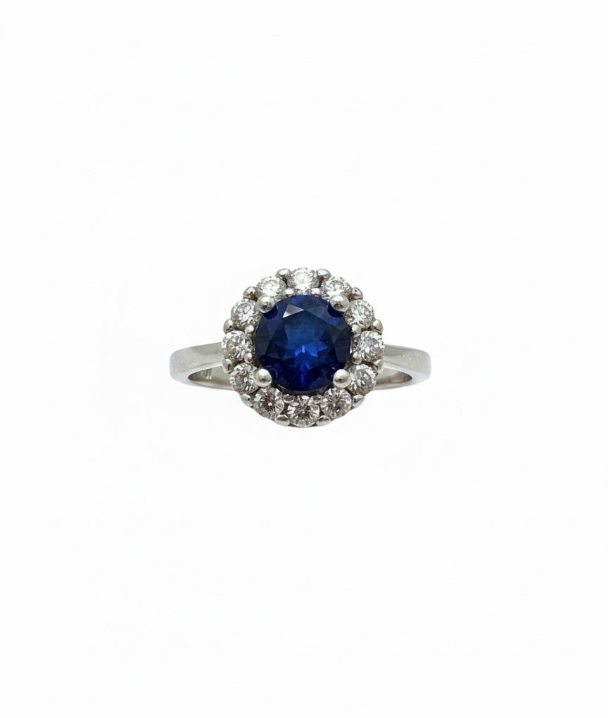 1 Silver Ring with Gemstone (Blue Sapphire) - Image 1
